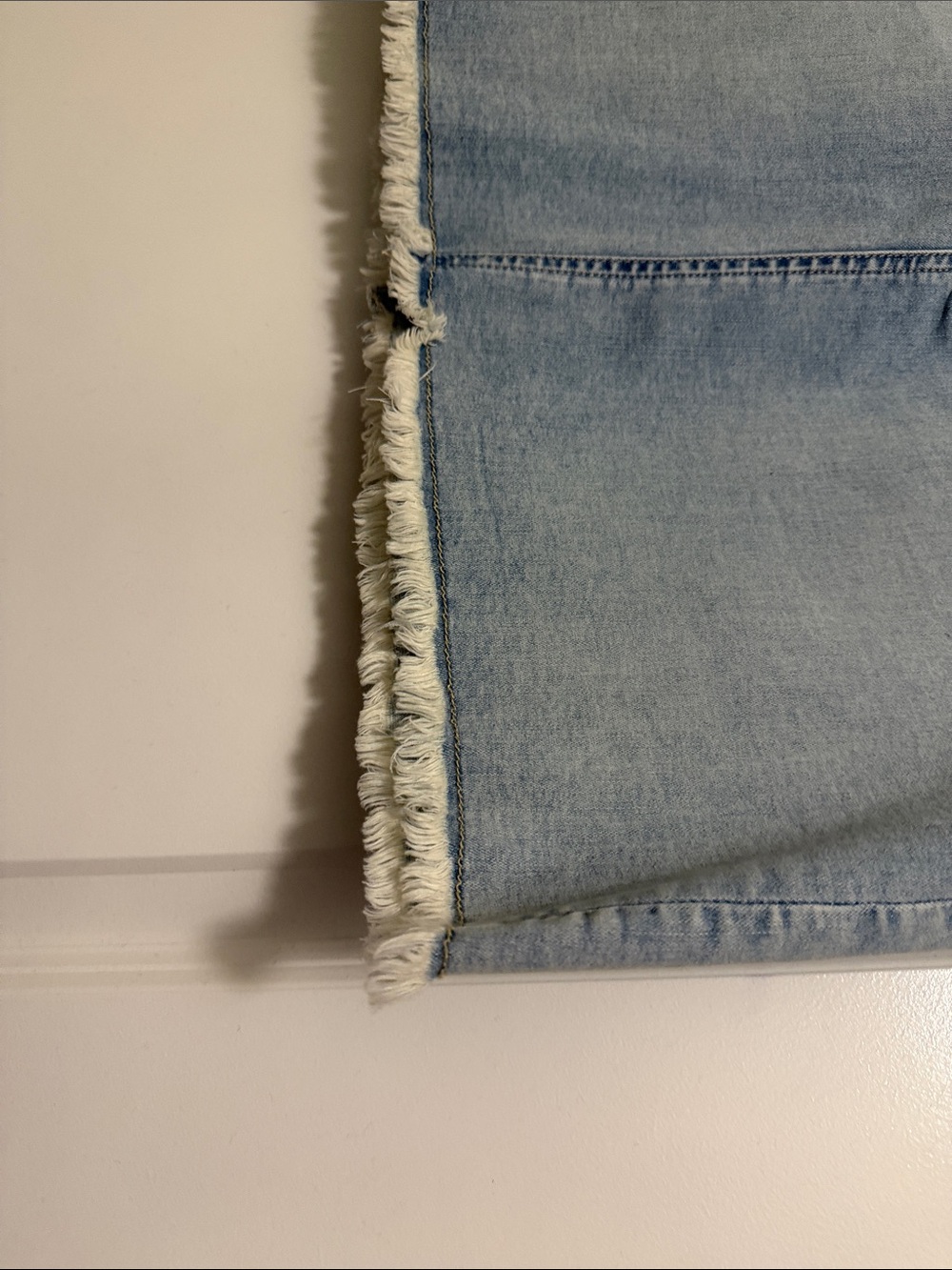 Tommy Bahama Light Blue Denim Mini Skirt with Frayed Hem - Picture 4 of 8
